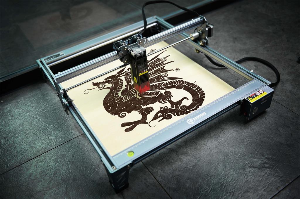 Laser engraver, laser engraving machine